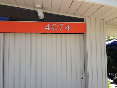 house numbers above garage door